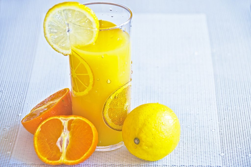 a glass of juice, fruit juice, juicy citrus