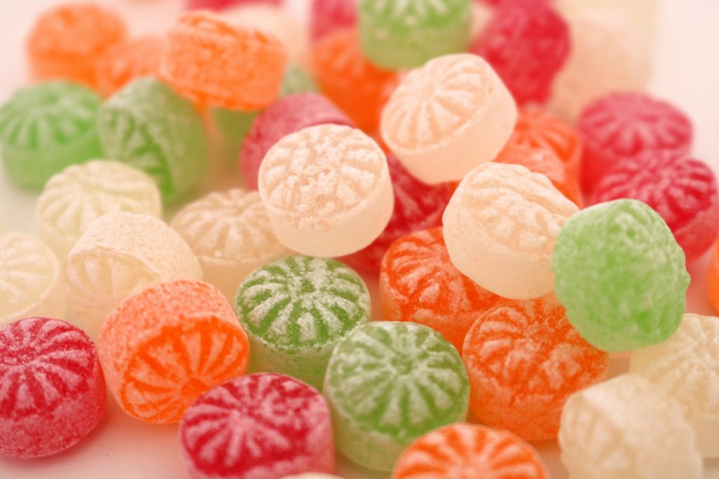 a pile of colorful candies sitting on top of a table